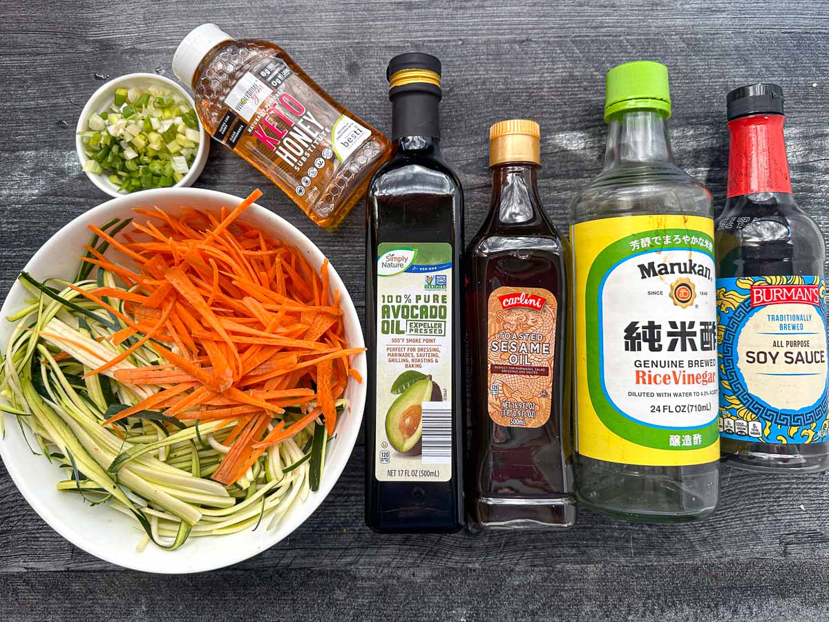 recipe ingredients - veggies, green onions, keto honey, oil, sesame oil, rice vinegar and soy sauce