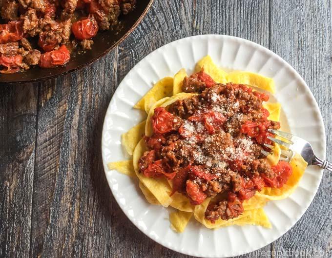 These low carb sausage and egg noodles are both fun and tasty. A delicious tomato and sausage sauce covers the noodles that are literally made from eggs.