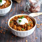 This spicy Mexican red lentils dish is a hearty, healthy meal. Spicy and comforting, this is the perfect vegetarian chili alternative.