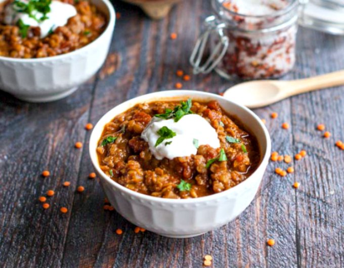 This spicy Mexican red lentils dish is a hearty, healthy meal. Spicy and comforting, this is the perfect vegetarian chili alternative.