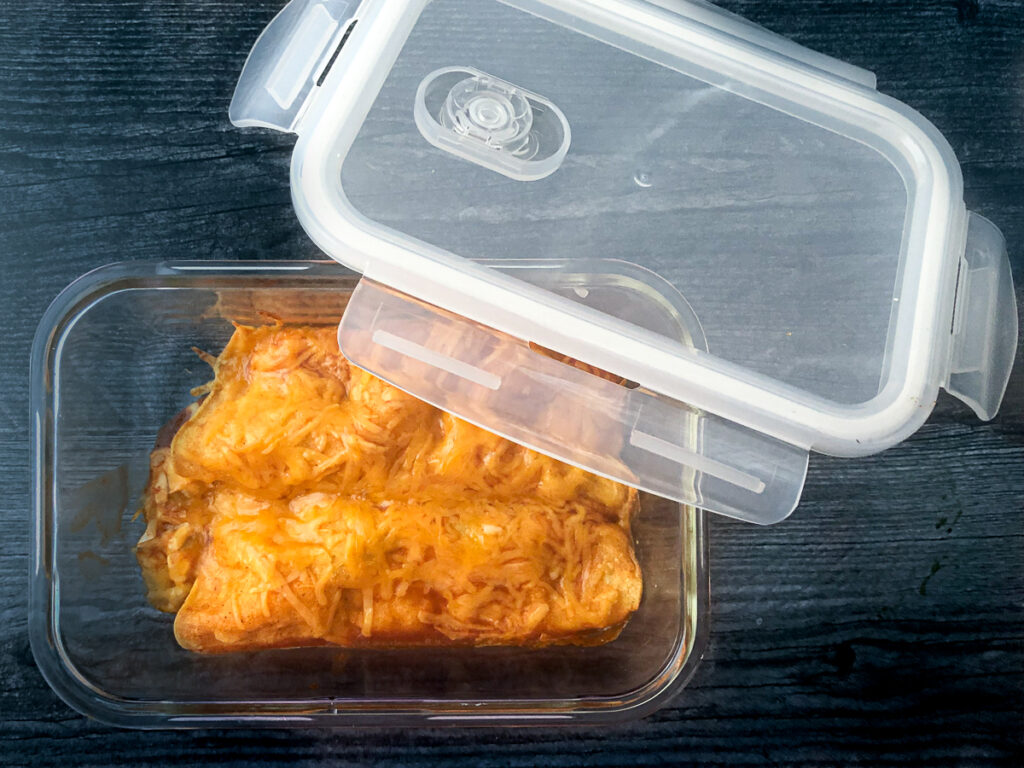 freezer container with 2 chicken enchiladas