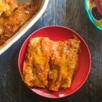 These easy chicken enchiladas are a family favorite. We like to make an extra pan of these and freeze for another night of easy enchiladas!