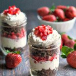 These cheesecake parfaits in a jar are not only fun to eat but they are low carb too! A special treat using seasonal strawberries.