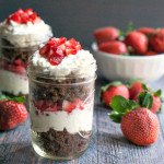 These cheesecake parfaits in a jar are not only fun to eat but they are low carb too! A special treat using seasonal strawberries.