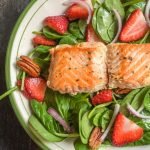 A fresh and delicious strawberry salmon salad with the sweet kick of ginger dressing. Easy to make for a healthy lunch or dinner.