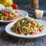 These lemon parmesan zucchini noodles are unbelievably flavorful, healthy and only take 10 minutes to make. Perfect with veggies from the garden.