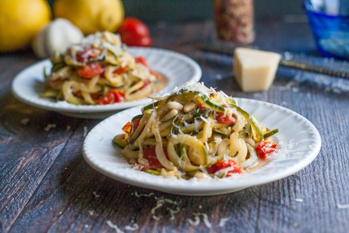 These lemon parmesan zucchini noodles are unbelievably flavorful, healthy and only take 10 minutes to make. Perfect with veggies from the garden.