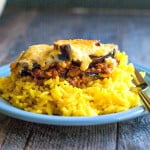 My mom's moussaka is a family favorite for we love the cinnamon spiced meat sauce and eggplant topped with creamy cheese sauce. Tastes great over rice. #SundaySupper