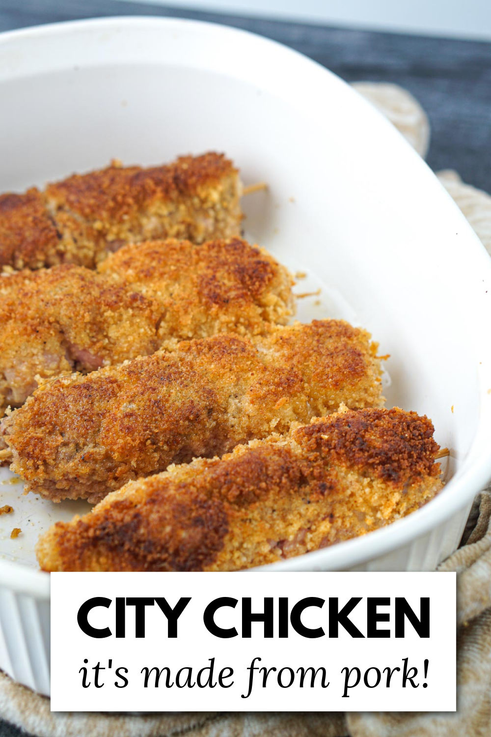 baking dish with breaded city chicken and text