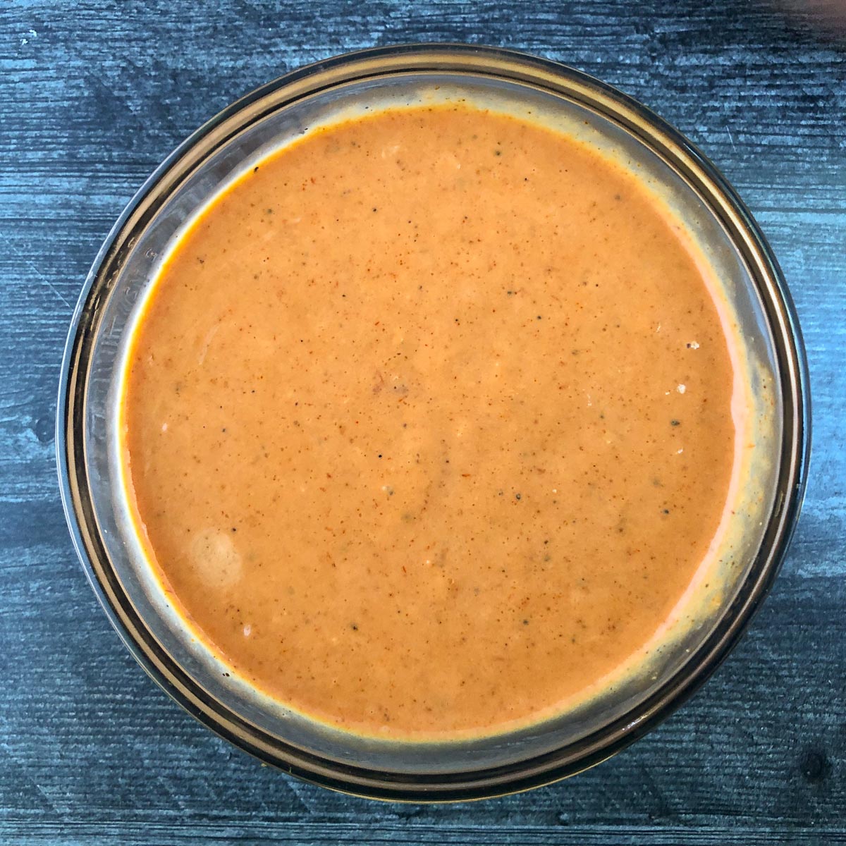 glass bowl with keto creamy French dressing