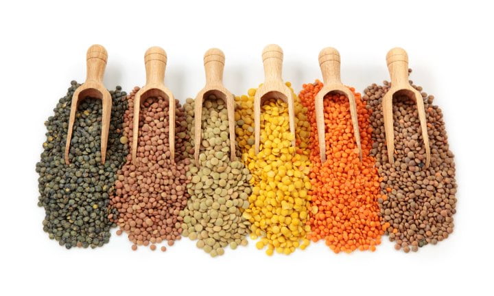 5 different kinds of dry lentils with scoop