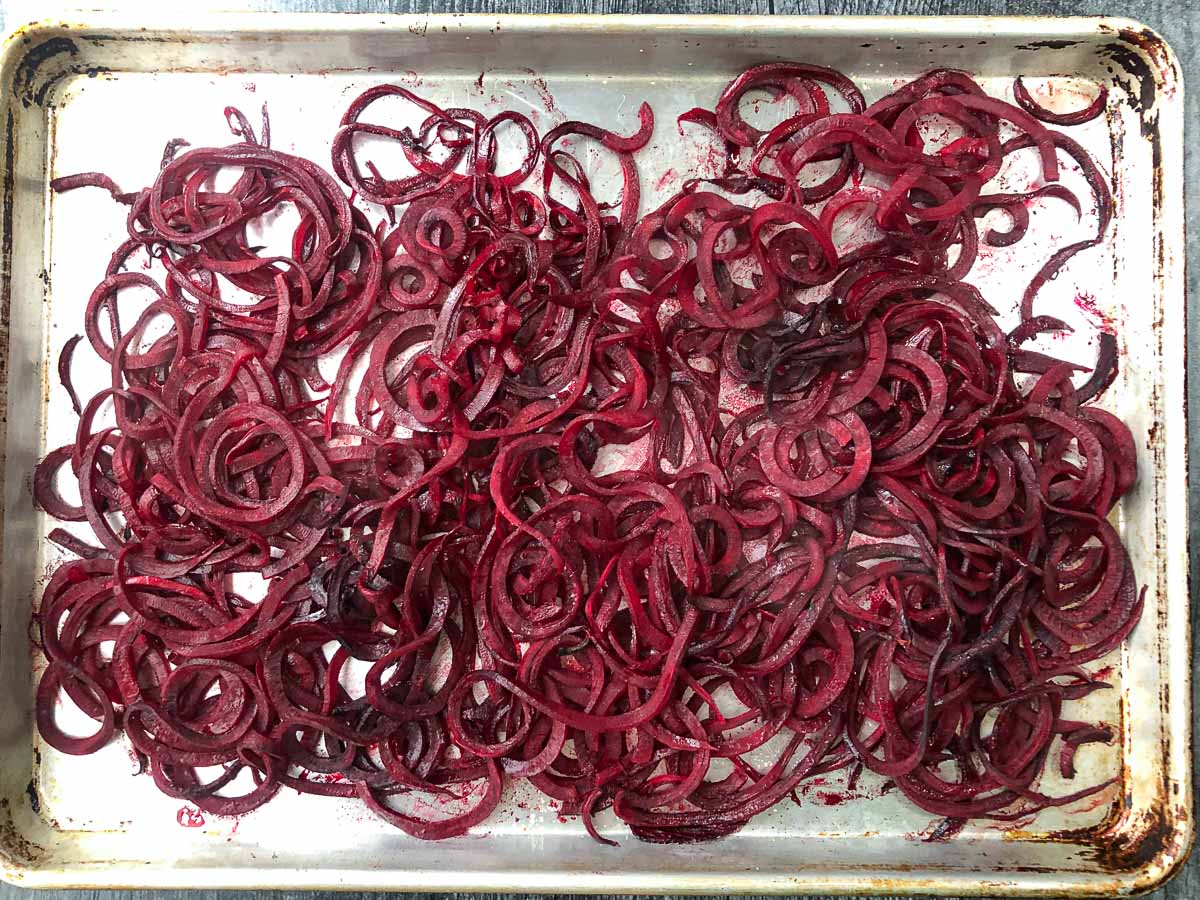 finished beet noodles on a baking sheet