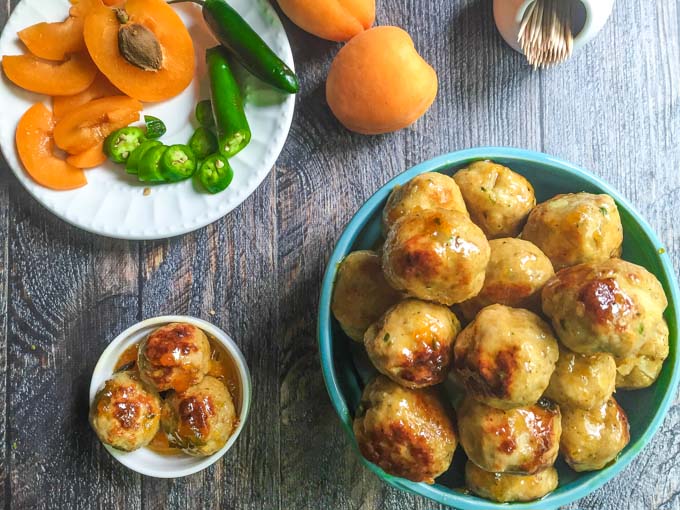 These spicy apricot chicken meatballs have the perfect balance of sweet and heat. They are easy to make and perfect for your next party. #SundaySupper