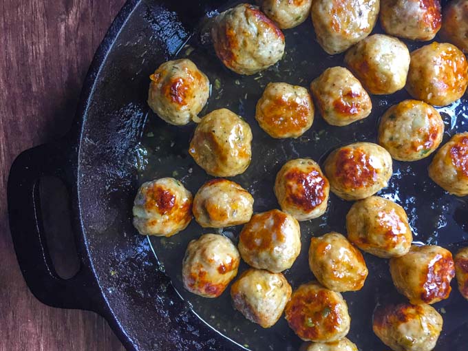 These spicy apricot chicken meatballs have the perfect balance of sweet and heat. They are easy to make and perfect for your next party. #SundaySupper