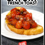 White plate with a piece of savory French toast topped with roasted tomatoes, bacon and sprinkling of parmesan cheese and text.
