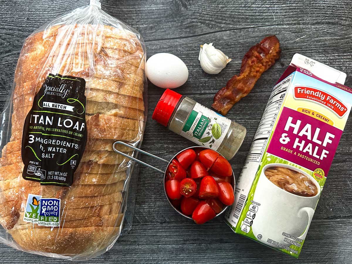 This tomato bacon French toast is a savory change from the usual sweet French toast. A nice and easy dish for breakfast or lunch. Recipe ingredients - Italian bread, egg, cream, bacon, Italian seasonings, garlic and Italian seasonings.