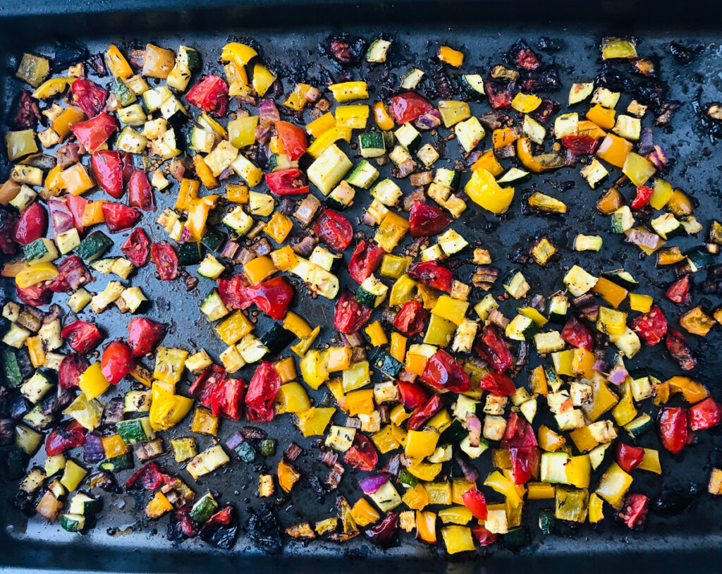 roasted vegetables on a baking sheet