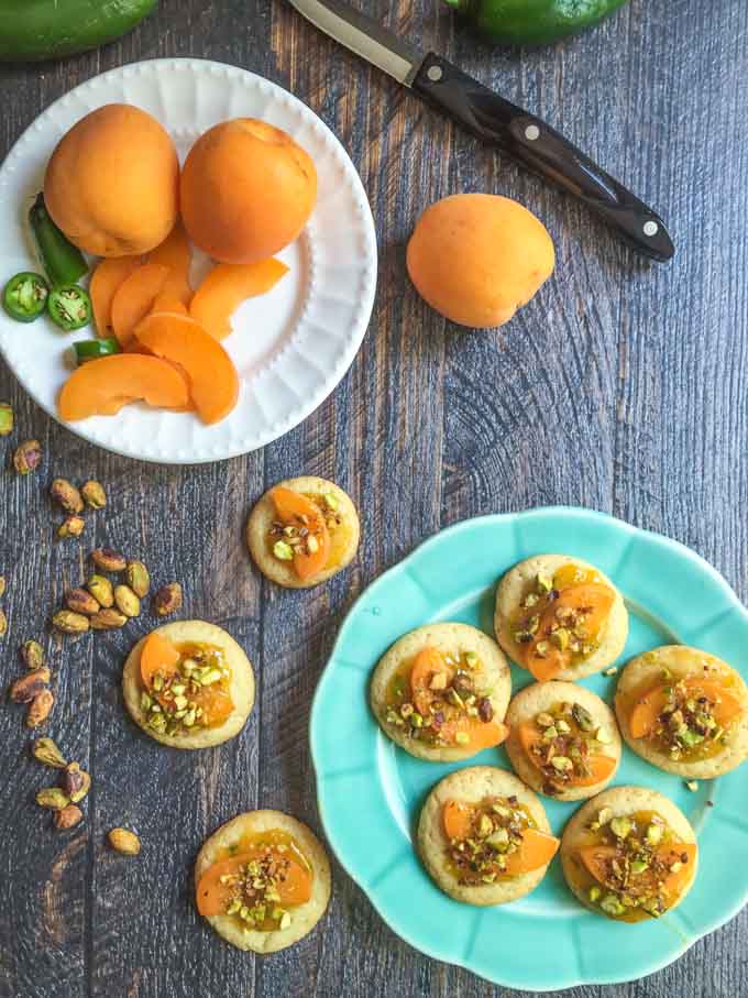 These spicy apricot pistachio cookies are easy to make and delightfully unique in flavor. These cookies have sweet apricots, spicy chiles and crunchy pistachios for a great taste.