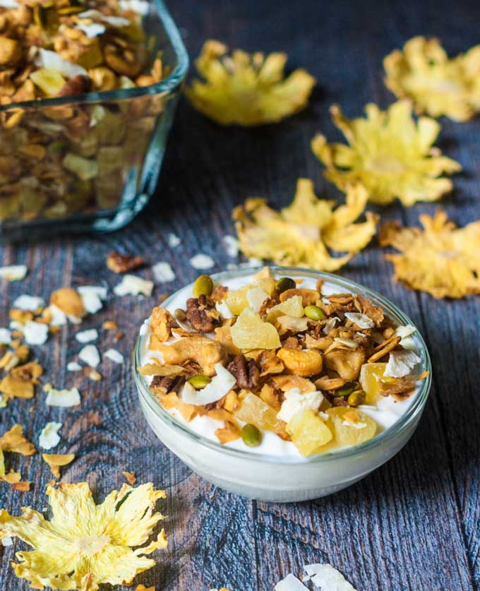 This pina colada granola is the perfect snack to celebrate National Pina Colada Day! A tasty mixture of nuts, seeds, coconut, pineapple and coconut sugar make for a tasty grain free tropical treat. #SundaySupper