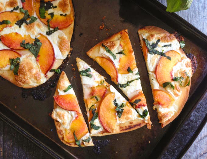 This easy peach & basil flatbread is perfect for those ripe peaches in season as well as herbs from the garden. A quick and tasty summer meal.