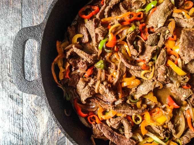This hot pepper steak is an easy week night dinner that combines Asian flavors with hot peppers and steak. Serve over rice for a delicious family meal.
