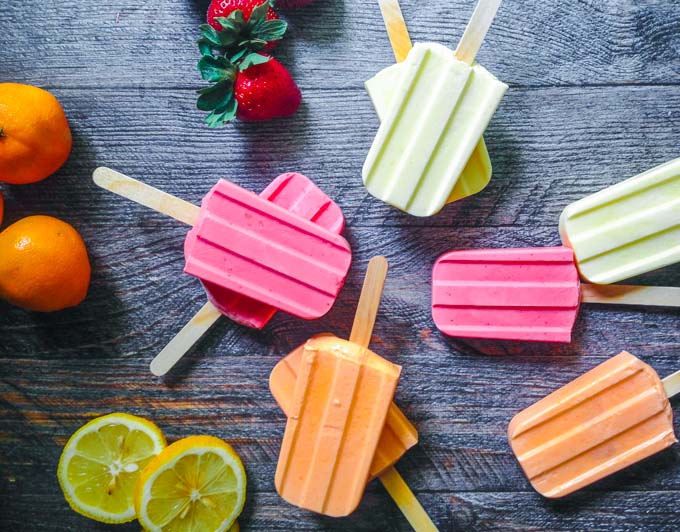 These low carb jello pops are a delicious and easy treat for summer. Only 2 ingredients and 1.1 carbs for these creamsicle pops.