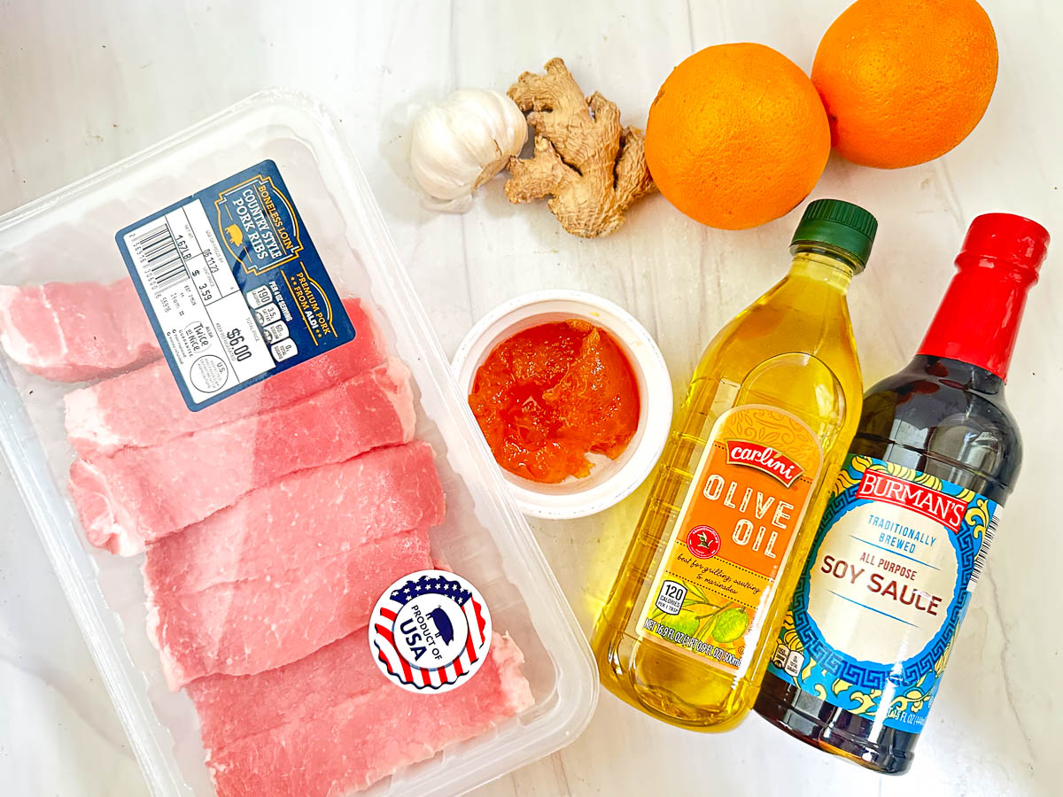 recipe ingredients for pork kebab marinade - country ribs, oranges, ginger, olive oil, orange marmalade, garlic and soy sauce