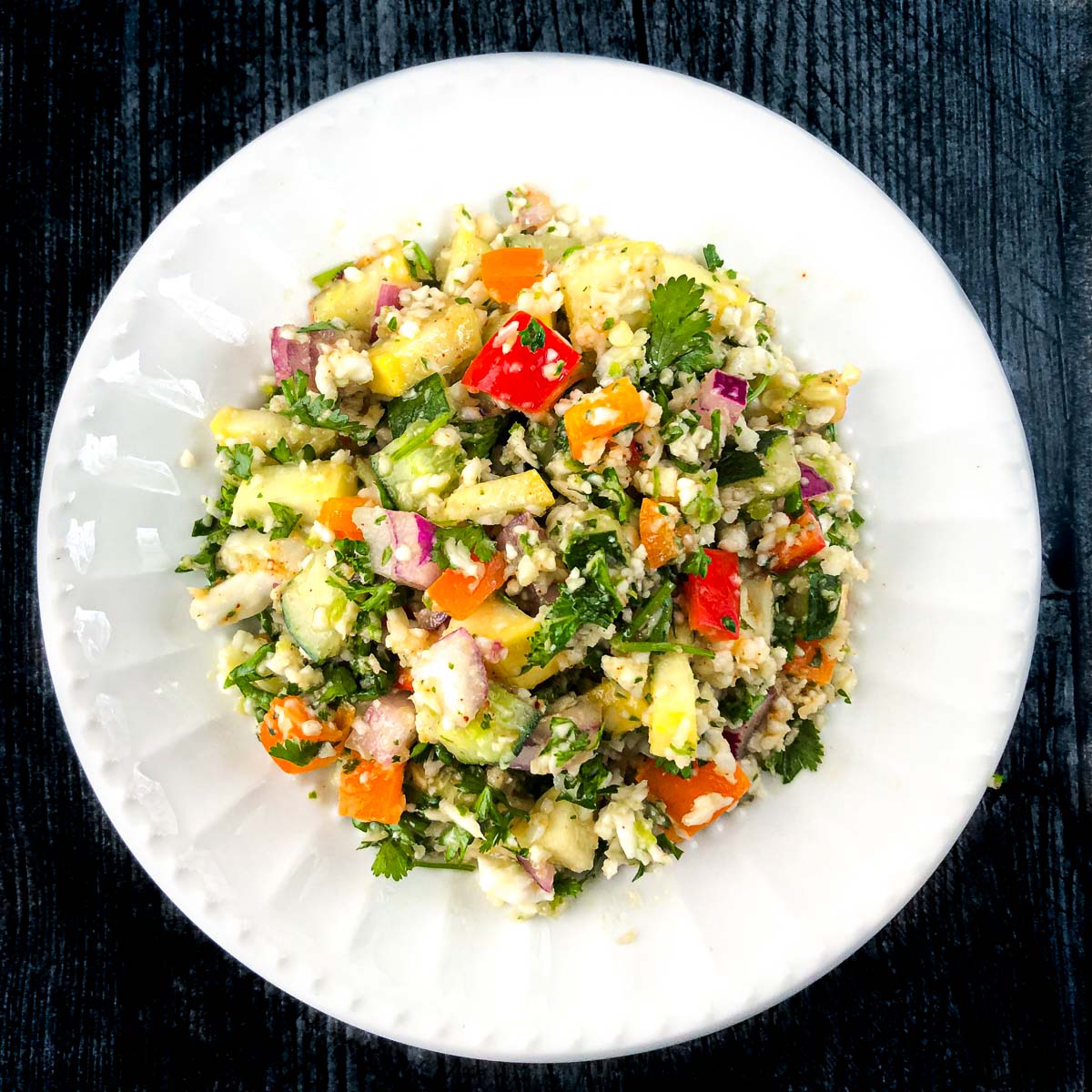 white plate with low carb Mexican tabouli salad