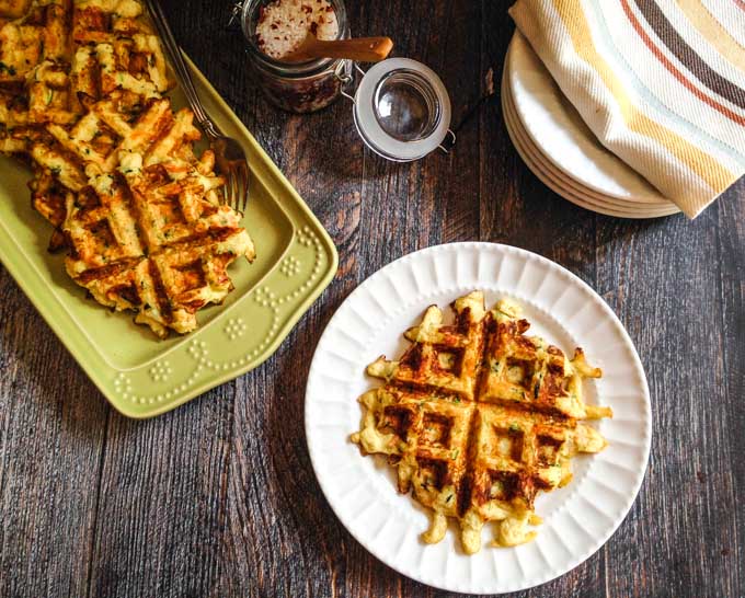 These Paleo zucchini & carrot waffles are quick to make and taste great. A savory, low carb, gluten free waffle.