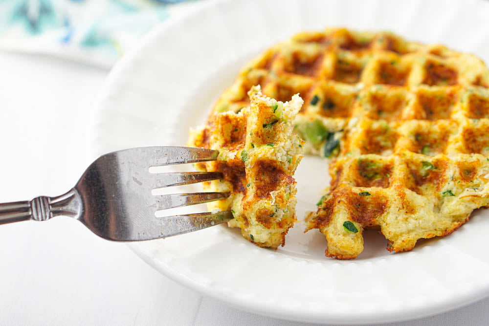 closeup of a forkful of dairy free vegetable waffle