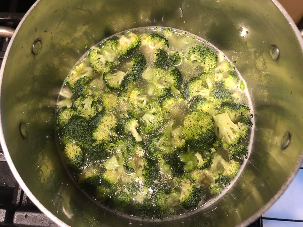 pan with broccoli florets added