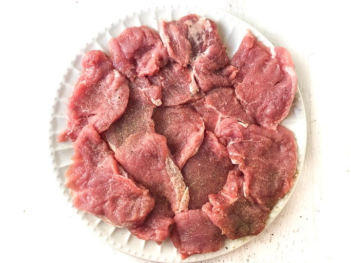 raw pork tenderloin cutlets pounded thin with salt and pepper