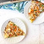 white plates with chicken & vegetable low carb pizza with text overlay