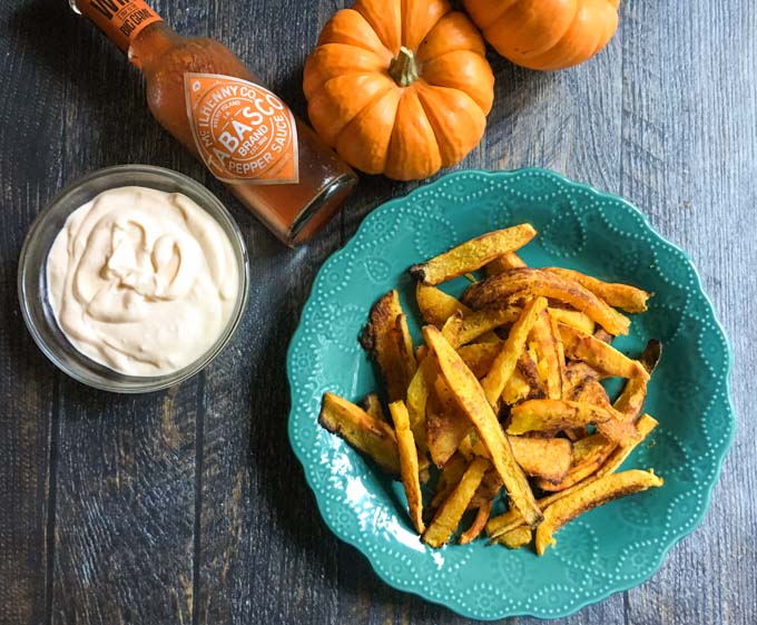 These pumpkin fries with buffalo aioli are a delicious side dish or snack.The sweetness of the pumpkin goes perfectly with  the spicy, creamy aioli.
