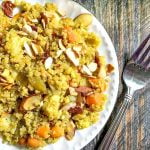 This curry vegetable quinoa pilaf is an easy and delicious side dish. This vegetarian dish only takes 15 minutes to make.
