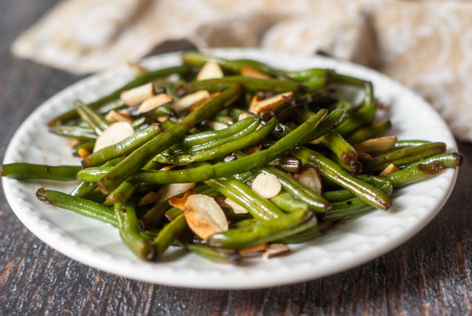 This easy Asian green beans almondine dish is a tasty, low carb side dish that you can whip up in less than 15 minutes and it's only 2.9g net carbs!