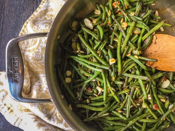 This easy Asian green beans almondine dish is a tasty, low carb side dish that you can whip up in less than 15 minutes and it's only 2.9g net carbs!