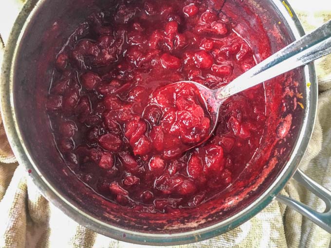 This sugar free cranberry sauce is a delicious alternative to the standard cranberry sauce. Hints of ginger, cinnamon and orange make it extra special.  And there is only 2.9g net carbs so it's low carb too! Perfect for Thanksgiving dinner.