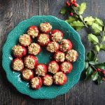These goat cheese & basil stuffed peppadews are an easy yet festive appetizer that are perfect for holiday parties!