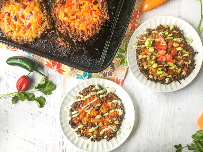 This low carb mini Mexican meatza recipe makes for a delicious lunch or dinner. Think taco meets burger meets pizza. Low carb and super tasty!