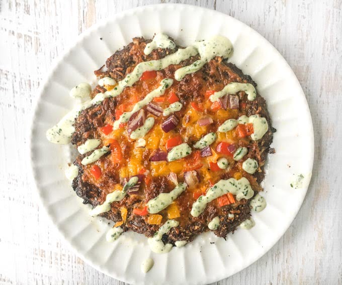 This low carb mini Mexican meatza recipe makes for a delicious lunch or dinner. Think taco meets burger meets pizza. Low carb and super tasty!