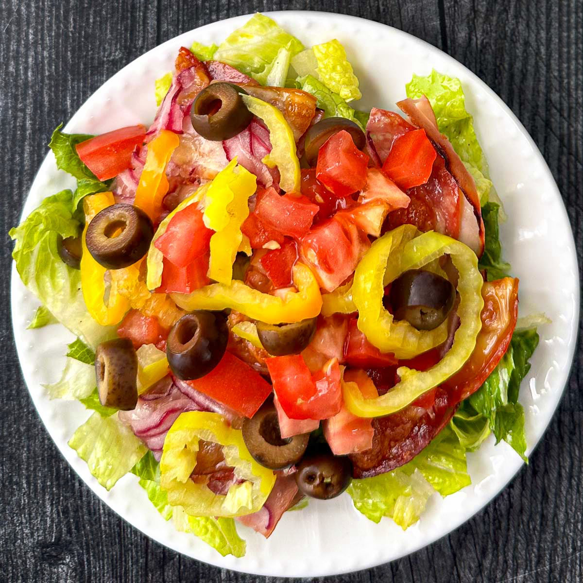 Italian sub salad on white plate