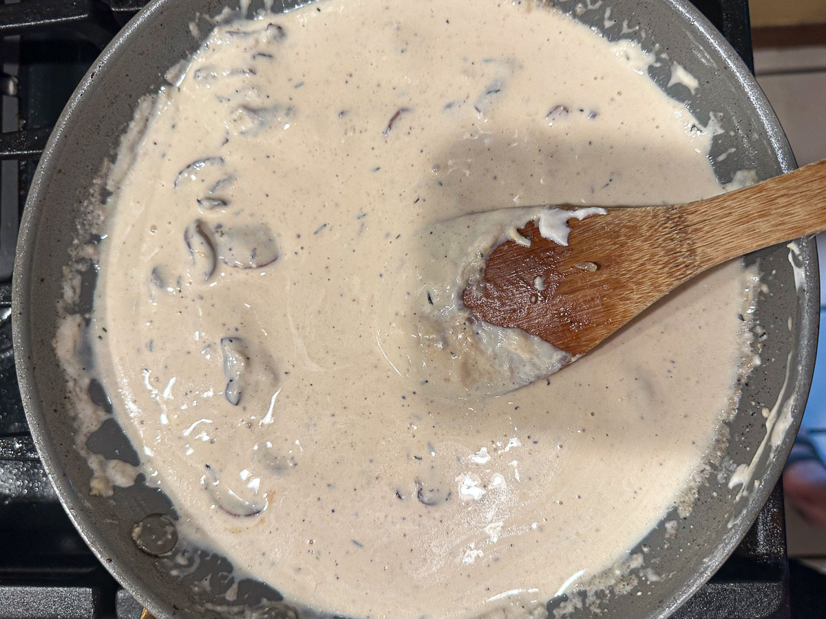 creamy mushroom sauce in pan