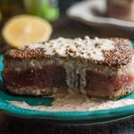 This peppered tuna steak recipe is simple but elegant. Meaty and tender these tuna steaks taste even better with a lemony dijon cream sauce for only 2.9g net carbs.