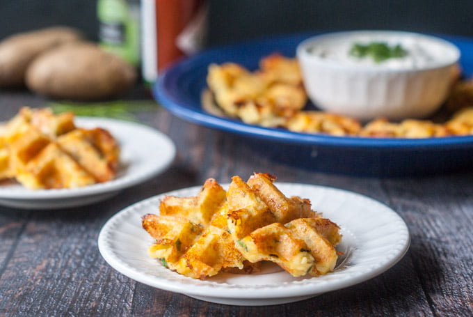 These potato & chive waffles are the perfect thing to take to the big game or your next party. Easy, delicious and gluten free, everyone will love them!