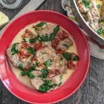 This tomato Asiago pork tenderloin is a rich and creamy skillet dinner that is only 3.6g net carbs per serving! Perfect for company, it takes 30 minutes start to finish.