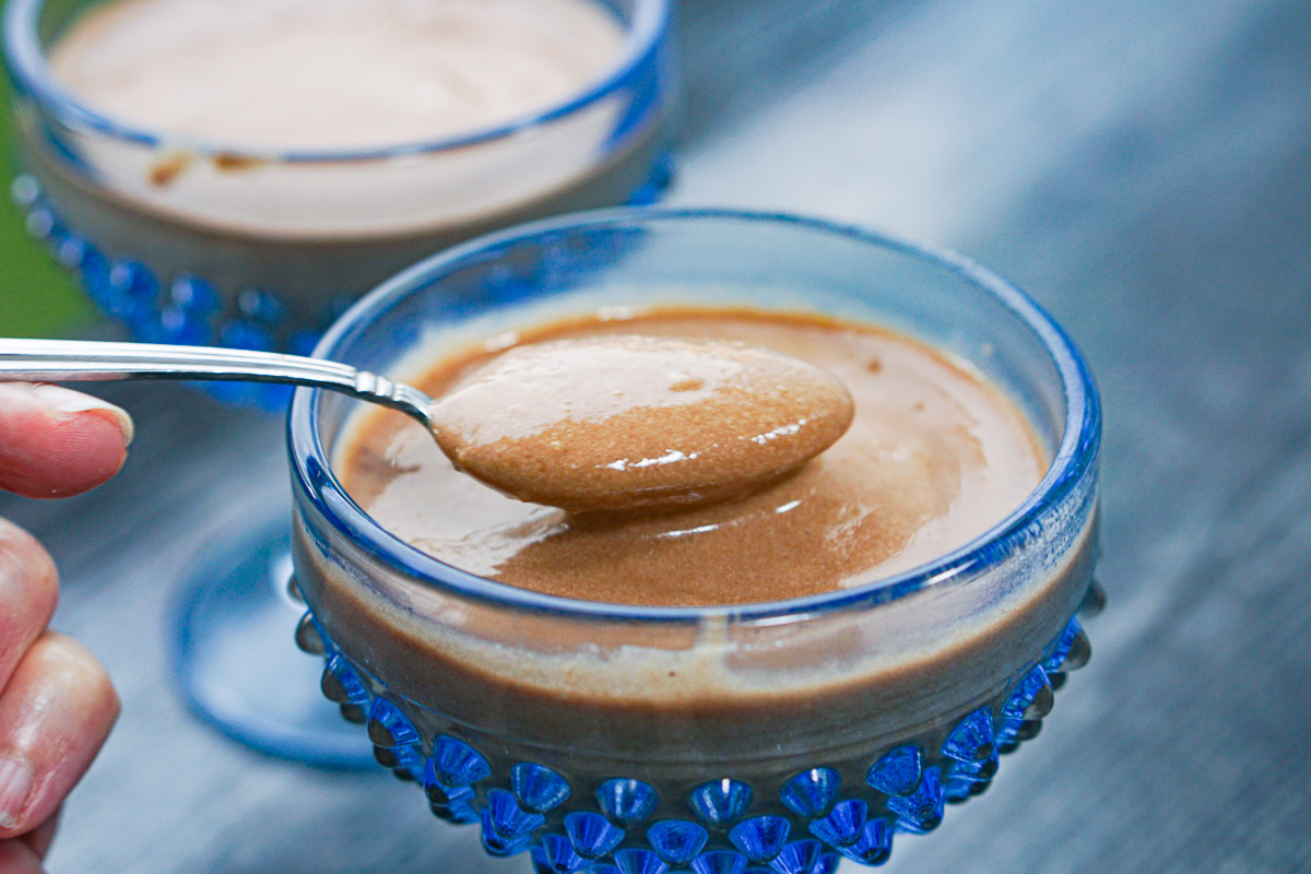 closeup of a spoonful of keto chocolate protein pudding