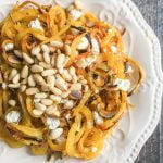 These golden beet noodles with pine nuts & goat cheese are so tasty you won't realize you are eating veggie noodles! And they take less that 20 minutes to make this gluten free, vegetarian dish! Easy, healthy, tasty.