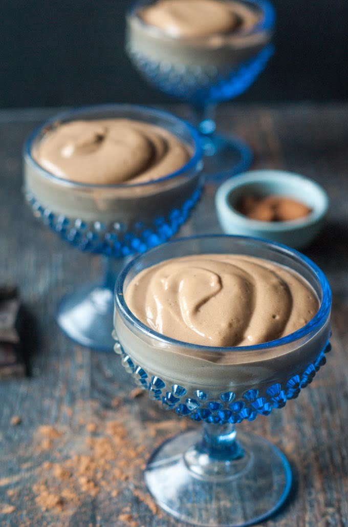 blue glass dessert bowls with chocolate protein powder 