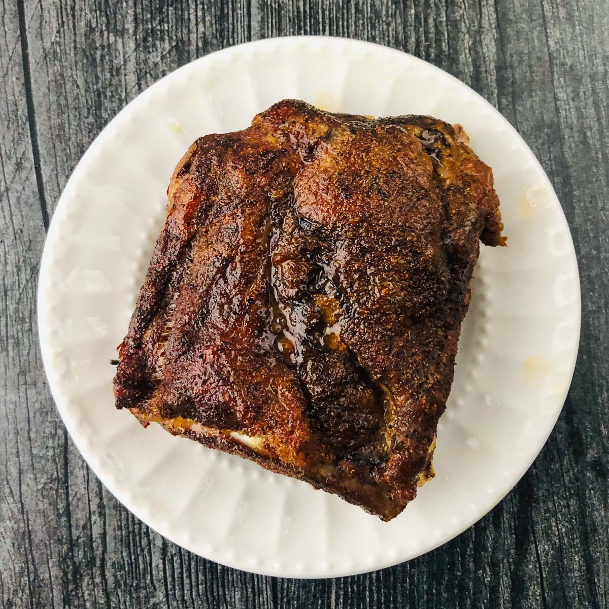 white plate with some low carb middle eastern slow cooked ribs